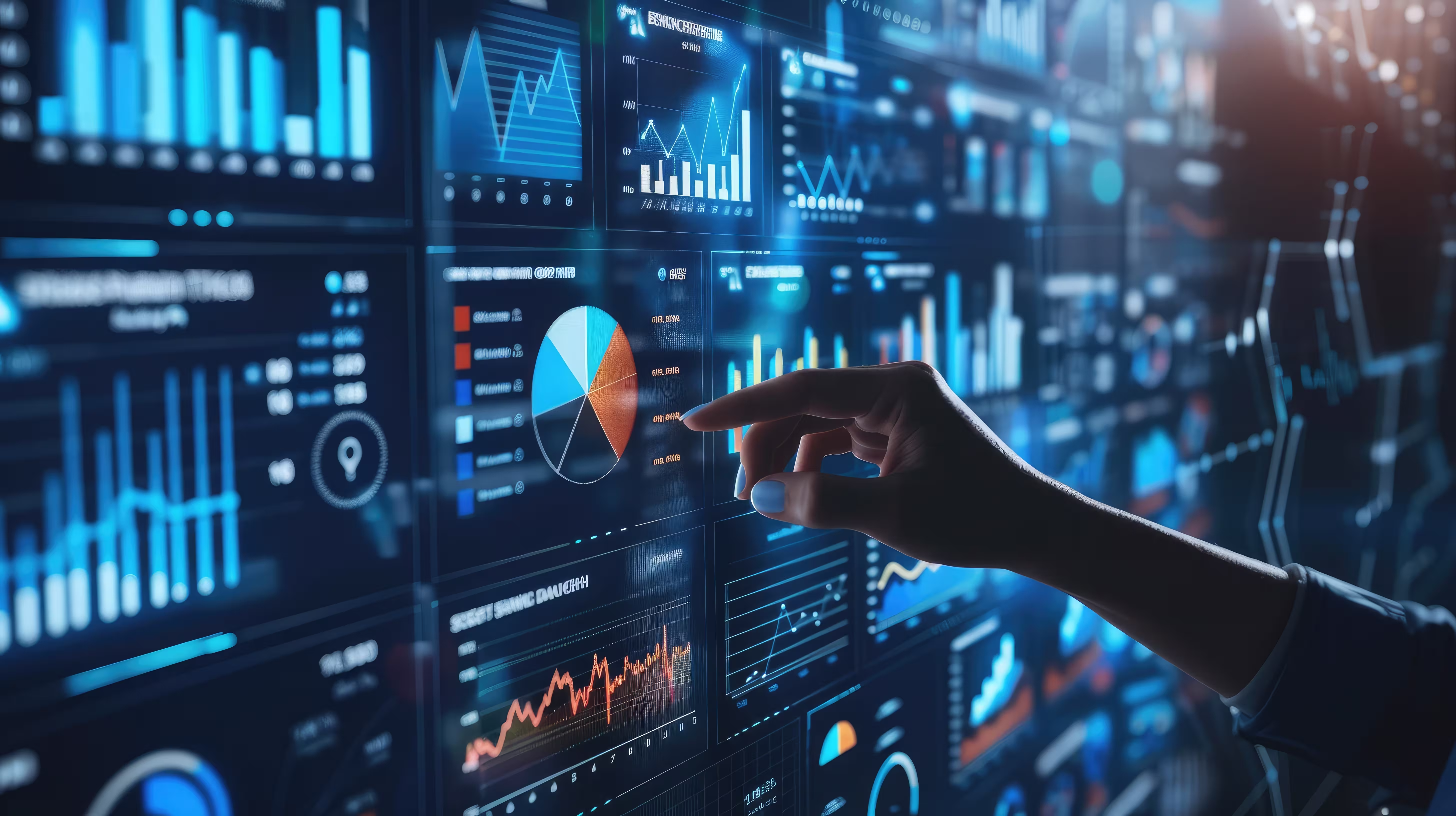 Hand touching a digital board with multiple charts